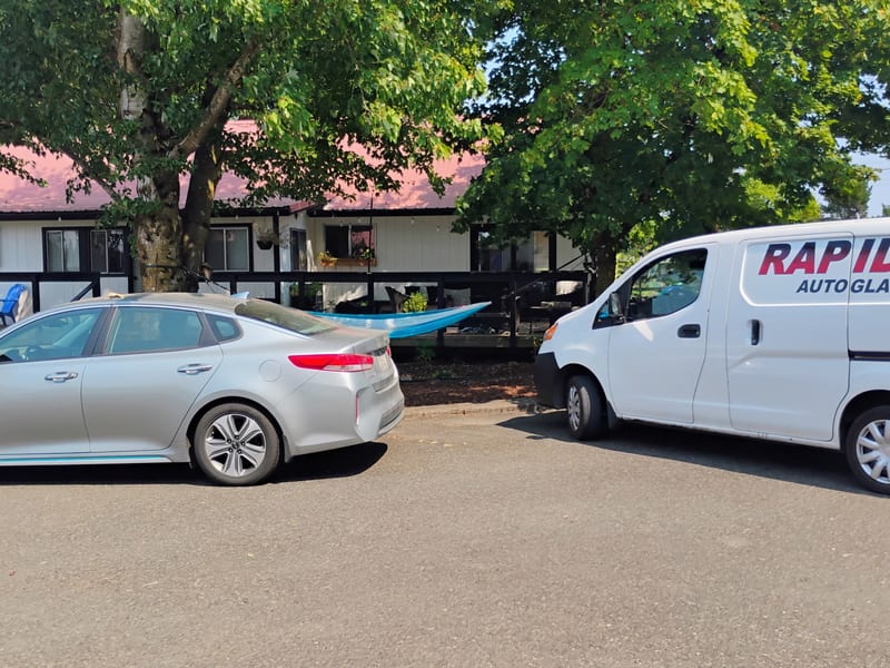 Auto glass service vehicle at customer location